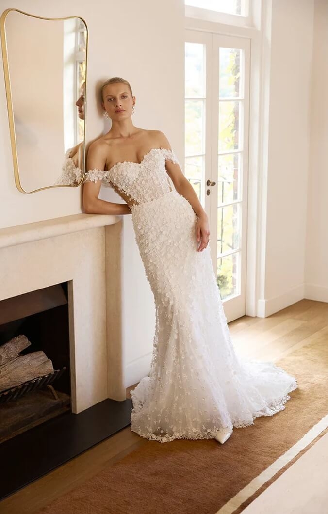 Model wearing a gown by La Premiere